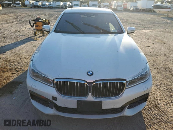 2016 BMW 7 Series 750i xDrive with VIN WBA7B0C59GG526741, listed as a Copart auction lot 86312384 with 90,360 mi miles and Salvage title. Bid and sale history available at DreamBid. Image 5.