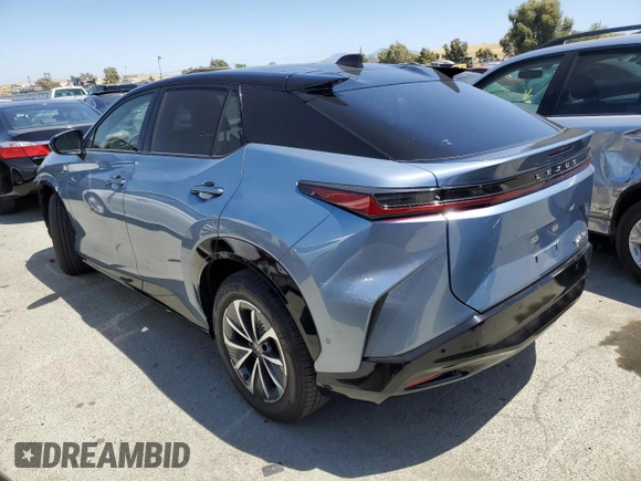 2023 Lexus RZ 450e Premium z VIN JTJAAAAB3PA000731, wystawiony jako Copart lot #57350214 z przebiegiem 7 642 mil mil oraz Szkoda całkowita • Salvage title. Historia ofert i sprzedaży dostępna na DreamBid. Obrazek 2.