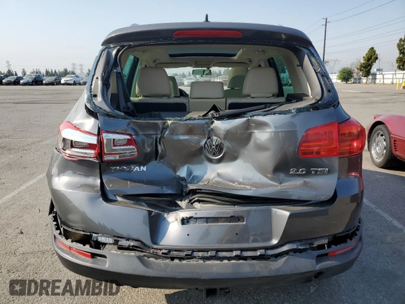 2013 Volkswagen Tiguan SE z VIN WVGAV7AX2DW023093, wystawiony jako Copart lot #64694405 z przebiegiem 137 460 mil mil oraz Szkoda całkowita • Salvage title. Historia ofert i sprzedaży dostępna na DreamBid. Obrazek 6.