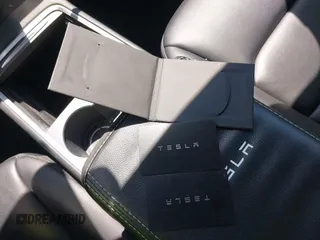 2022 Tesla Model Y Long Range with VIN 7SAYGDEE7NF426404, listed as a IAAI auction lot 42040490 with 39,635 mi miles and . Bid and sale history available at carsss.com. Image 11.