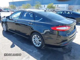 2015 Ford Fusion SE Hybrid with VIN 3FA6P0LU9FR294551, listed as a IAAI auction lot 41545007 with 179,906 mi miles. Bid and sale history available at carsss.com. Image 3.