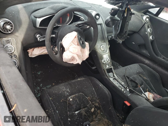 2015 McLaren 650S z VIN SBM11DAA8FW004651, wystawiony jako Copart lot #84895284 z przebiegiem Nie podano mil oraz Szkody całkowita. Historia ofert i sprzedaży dostępna na DreamBid. Obrazek 8.