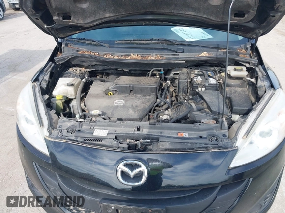 2012 Mazda 5 Sport with VIN JM1CW2BL3C0109930, listed as a IAAI auction lot 42197142 with 154,913 mi miles. Bid and sale history available at carsss.com. Image 10.