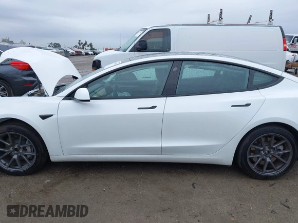 2023 Tesla Model 3 with VIN 5YJ3E1EA6PF432397, listed as a IAAI auction lot 41760895 with 15,692 mi miles and . Bid and sale history available at DreamBid. Image 15.