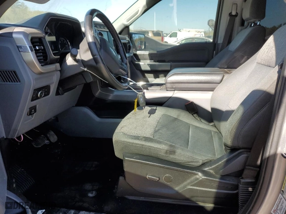 2021 Ford F-150 XL with VIN 1FTFW1E55MFC65325, listed as a Copart auction lot 50054415 with 116,442 mi miles and Salvage Title. Bid and sale history available at carsss.com. Image 7.