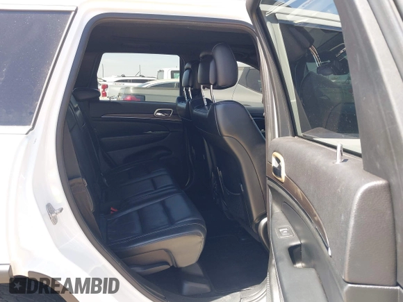 2014 Jeep Grand Cherokee Limited with VIN 1C4RJEBG6EC453833, listed as a IAAI auction lot 41901390 with 148,576 mi miles and . Bid and sale history available at DreamBid. Image 8.