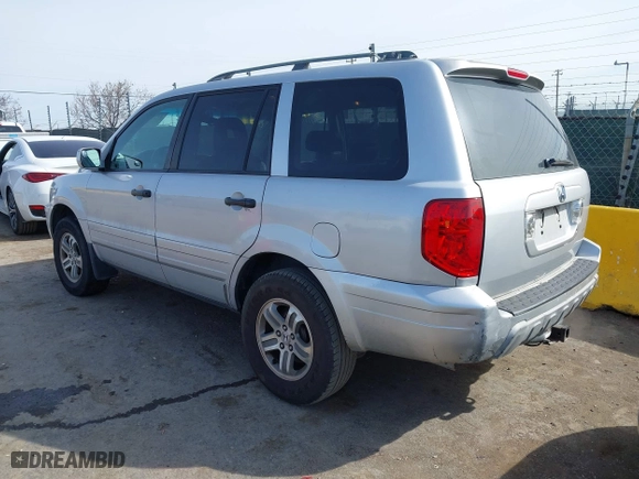 2004 Honda Pilot EX with VIN 2HKYF18514H503083, listed as a IAAI auction lot 41796369 with 172,187 mi miles. Bid and sale history available at carsss.com. Image 3.