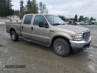 2002 Ford F-250 XL with VIN 1FTNW20S62ED38381, listed as a Copart auction lot 44265915 with 131,549 mi miles and Salvage Title. Bid and sale history available at DreamBid. Image 4.