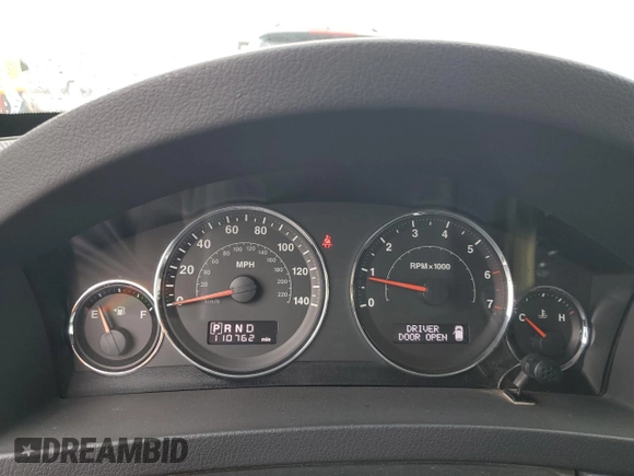 2009 Jeep Grand Cherokee Laredo with VIN 1J8HR48P19C555965, listed as a Copart auction lot 45602315 with 110,762 mi miles and Salvage Title. Bid and sale history available at carsss.com. Image 9.