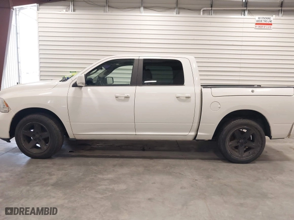 2009 Dodge Ram 1500 Sport with VIN 1D3HB13T39J521768, listed as a IAAI auction lot 42096308 with 173,989 mi miles. Bid and sale history available at carsss.com. Image 15.