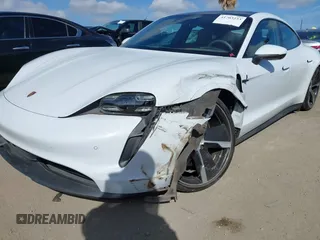 2021 Porsche Taycan 4S z VIN WP0AB2Y12MSA43873, wystawiony jako IAAI lot #41703233 z przebiegiem 24 452 mil mil oraz . Historia ofert i sprzedaży dostępna na DreamBid. Obrazek 6.