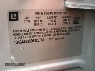 2013 Buick LaCrosse z VIN 1G4GA5E35DF128714, wystawiony jako Copart lot #61446425 z przebiegiem 128 419 mil mil oraz Szkoda całkowita • Salvage title. Historia ofert i sprzedaży dostępna na DreamBid. Obrazek 12.