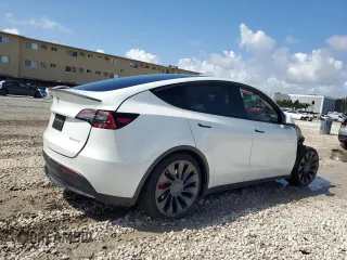 2023 Tesla Model Y Performance with VIN 7SAYGDEF0PF832570, listed as a Copart auction lot 51141415 with Not Provided miles and Non Repairable. Bid and sale history available at DreamBid. Image 3.