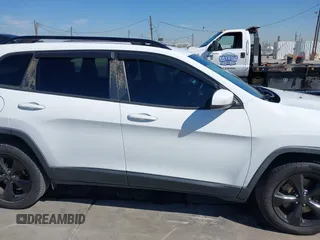 2016 Jeep Cherokee 75th Anniversary with VIN 1C4PJLCB9GW107422, listed as a IAAI auction lot 41997941 with 121,641 mi miles and . Bid and sale history available at carsss.com. Image 13.