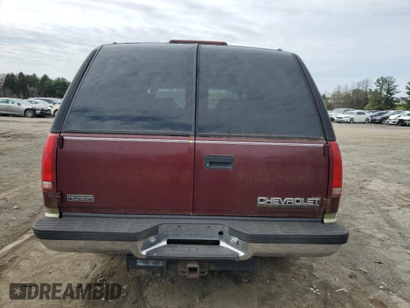 1999 Chevrolet Suburban z VIN 1GNFK16R2XJ328550, wystawiony jako Copart lot #53179525 z przebiegiem 170 914 mil mil oraz Czysty tytuł • Clean title. Historia ofert i sprzedaży dostępna na DreamBid. Obrazek 6.