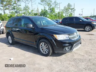 2017 Dodge Journey SXT z VIN 3C4PDCBG3HT588795, wystawiony jako IAAI lot #42274010 z przebiegiem 161 912 mil mil oraz . Historia ofert i sprzedaży dostępna na DreamBid. Obrazek 1.