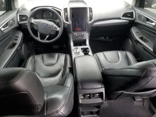 2021 Ford Edge Titanium with VIN 2FMPK4K96MBA16599, listed as a Copart auction lot 53920735 with 71,376 mi miles and Salvage title. Bid and sale history available at DreamBid. Image 8.