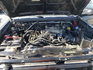 2000 Nissan Frontier XE z VIN 1N6ED27Y3YC324102, wystawiony jako Copart lot #56922155 z przebiegiem 202 233 mil mil oraz Szkoda całkowita • Salvage title. Historia ofert i sprzedaży dostępna na DreamBid. Obrazek 11.