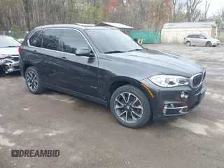 2017 BMW X5 xDrive35i with VIN 5UXKR0C35H0V76620, listed as a IAAI auction lot 41944975 with 147,667 mi miles. Bid and sale history available at carsss.com. Image 1.