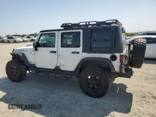 2014 Jeep Wrangler Unlimited Rubicon with VIN 1C4BJWFG0EL201559, listed as a Copart auction lot 59580575 with 182,101 mi miles and Salvage title. Bid and sale history available at DreamBid. Image 2.