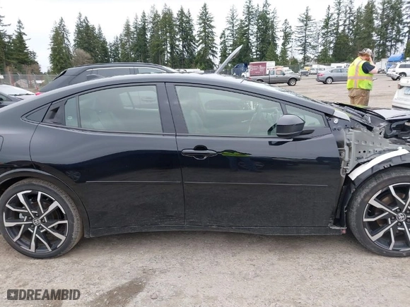 2024 Toyota Prius Prime SE with VIN JTDACACUXR3019263, listed as a IAAI auction lot 41911062 with NaN miles. Bid and sale history available at carsss.com. Image 14.
