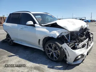 2021 BMW X5 xDrive45e с VIN 5UXTA6C02M9F15948, выставлен на аукционе Copart как лот 51549025 с пробегом 43 170 миль миль и Списание • Salvage title. История ставок и продаж доступна на DreamBid. Изображение 4.