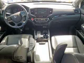 2020 Honda Pilot Touring 7-Passenger with VIN 5FNYF6H69LB018905, listed as a Copart auction lot 61209685 with 61,637 mi miles and Salvage title. Bid and sale history available at DreamBid. Image 8.