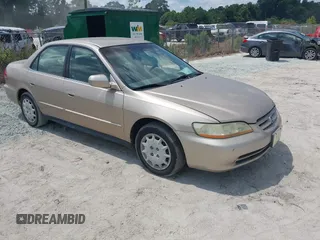 2002 Honda Accord LX with VIN 1HGCG56412A029571, listed as a IAAI auction lot 42606545 with 186,321 mi miles and . Bid and sale history available at DreamBid. Image 1.