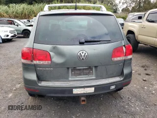 2006 Volkswagen Touareg 4.2L V8 z VIN WVGZM77L16D049631, wystawiony jako Copart lot #84882844 z przebiegiem Nie podano mil oraz Szkoda całkowita • Salvage title. Historia ofert i sprzedaży dostępna na DreamBid. Obrazek 6.