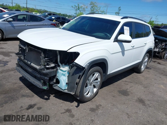 2021 Volkswagen Atlas SE z VIN 1V2WR2CA2MC529355, wystawiony jako IAAI lot #41972048 z przebiegiem 63 970 mil mil oraz . Historia ofert i sprzedaży dostępna na DreamBid. Obrazek 17.