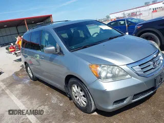 2010 Honda Odyssey EX with VIN 5FNRL3H44AB059711, listed as a IAAI auction lot 42057760 with 225,486 mi miles and . Bid and sale history available at DreamBid. Image 1.