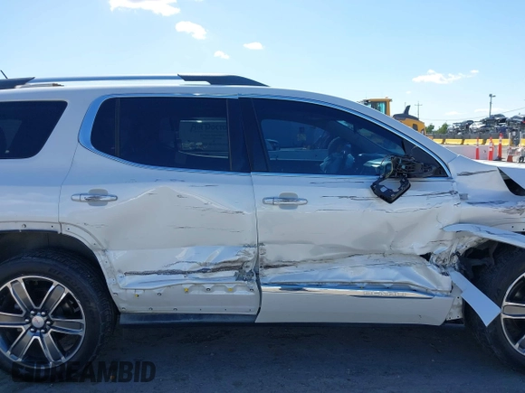 2017 GMC Acadia Denali z VIN 1GKKNXLS4HZ162970, wystawiony jako IAAI lot #42266517 z przebiegiem 60 605 mil mil oraz . Historia ofert i sprzedaży dostępna na DreamBid. Obrazek 13.