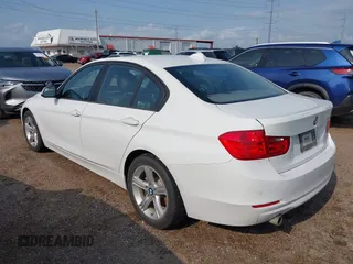 2015 BMW 3 Series 320i with VIN WBA3B1G5XFNT05903, listed as a IAAI auction lot 42063574 with Not Provided miles. Bid and sale history available at carsss.com. Image 3.