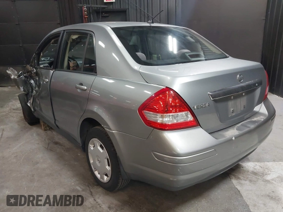 2009 Nissan Versa 1.8 S with VIN 3N1BC11EX9L396439, listed as a IAAI auction lot 42049665 with 49,617 mi miles. Bid and sale history available at carsss.com. Image 3.