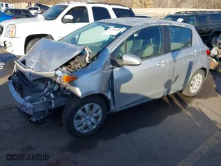 2012 Toyota Yaris L with VIN JTDKTUD36CD511401, listed as a IAAI auction lot 41321430 with 150,896 mi miles. Bid and sale history available at carsss.com. Image 17.