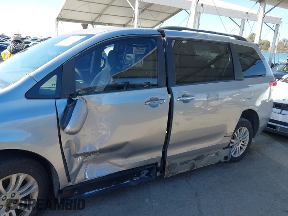 2011 Toyota Sienna XLE AAS with VIN 5TDYK3DC0BS107522, listed as a IAAI auction lot 41722324 with 171,855 mi miles and . Bid and sale history available at DreamBid. Image 6.