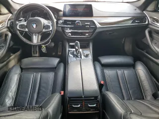 2019 BMW 5 Series M550i xDrive with VIN WBAJB9C56KB288170, listed as a Copart auction lot 54415635 with Not provided miles and Non repairable. Bid and sale history available at DreamBid. Image 8.