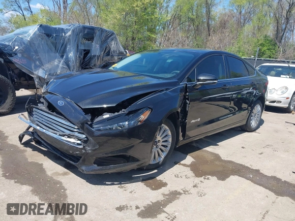 2014 Ford Fusion SE Hybrid with VIN 3FA6P0LU4ER252089, listed as a IAAI auction lot 41982070 with 47,512 mi miles. Bid and sale history available at carsss.com. Image 2.