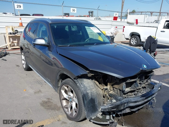 2014 BMW X1 xDrive28i with VIN WBAVL1C57EVY23722, listed as a IAAI auction lot 41839543 with 121,742 mi miles. Bid and sale history available at carsss.com. Image 1.