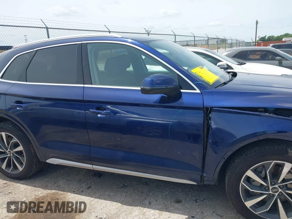 2021 Audi Q5 Premium with VIN WA1AAAFY7M2004975, listed as a IAAI auction lot 42190283 with 56,810 mi miles and . Bid and sale history available at DreamBid. Image 13.