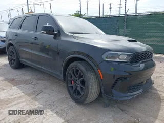 2021 Dodge Durango SRT Hellcat z VIN 1C4SDJH90MC689175, wystawiony jako IAAI lot #42244275 z przebiegiem 17 240 mil mil oraz . Historia ofert i sprzedaży dostępna na DreamBid. Obrazek 1.