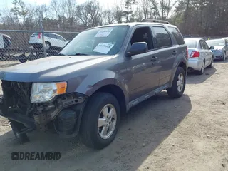 2010 Ford Escape XLT z VIN 1FMCU9D71AKC60423, wystawiony jako IAAI lot #41759168 z przebiegiem 143 734 mil mil oraz . Historia ofert i sprzedaży dostępna na DreamBid. Obrazek 2.