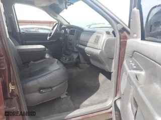 2005 Dodge Ram 1500 SLT with VIN 1D7HA18D05S215506, listed as a IAAI auction lot 41957222 with 143,992 mi miles. Bid and sale history available at carsss.com. Image 5.