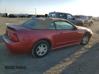 1999 Ford Mustang with VIN 1FAFP4446XF231749, listed as a Copart auction lot 73981604 with Not provided miles and Clean title. Bid and sale history available at DreamBid. Image 3.