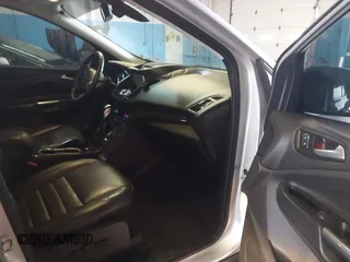 2015 Ford Escape Titanium z VIN 1FMCU9J96FUB23902, wystawiony jako IAAI lot #42497188 z przebiegiem 164 452 mil mil oraz . Historia ofert i sprzedaży dostępna na DreamBid. Obrazek 5.