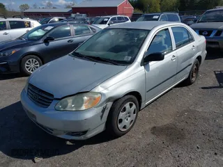 2003 Toyota Corolla CE with VIN 1NXBR32E23Z015648, listed as a IAAI auction lot 42056596 with 287,999 mi miles and . Bid and sale history available at DreamBid. Image 2.
