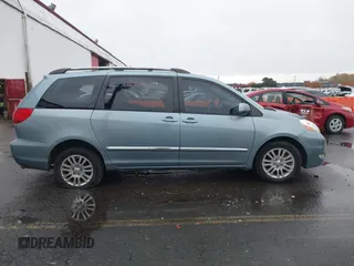 2007 Toyota Sienna XLE z VIN 5TDBK22C97S003525, wystawiony jako IAAI lot #40907947 z przebiegiem Nie podano mil oraz . Historia ofert i sprzedaży dostępna na DreamBid. Obrazek 13.