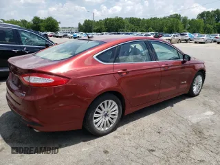 2014 Ford Fusion SE Hybrid with VIN 3FA6P0LU3ER253735, listed as a Copart auction lot 63222635 with 147,470 mi miles and Salvage title. Bid and sale history available at DreamBid. Image 3.