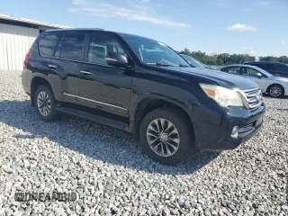2011 Lexus GX 460 Premium with VIN JTJJM7FX6B5024652, listed as a Copart auction lot 61061915 with 212,477 mi miles and Clean title. Bid and sale history available at DreamBid. Image 4.