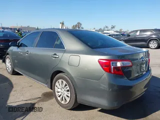 2014 Toyota Camry L with VIN 4T1BF1FK7EU731591, listed as a IAAI auction lot 41917728 with 85,504 mi miles. Bid and sale history available at carsss.com. Image 3.